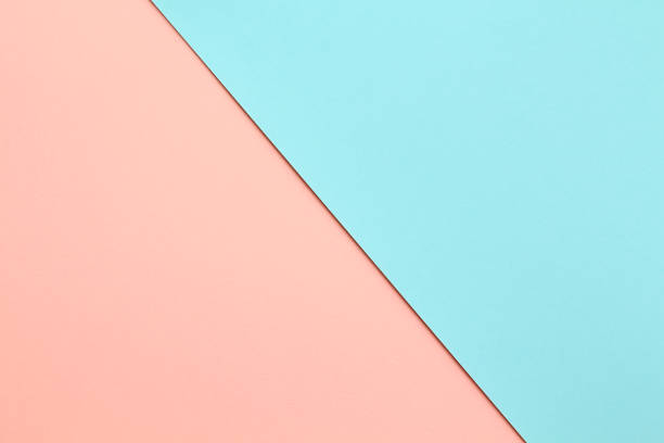 Abstract geometricpaper background in soft pastel pink and blue colors Abstract geometric water color paper background in soft pastel pink and blue trend colors with diagonal line. toned image photos stock pictures, royalty-free photos & images