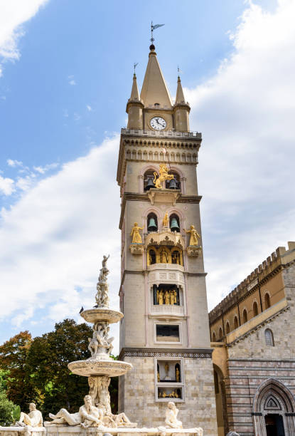 istock clock tower and fountain in Messina, sicily, italy 857922936