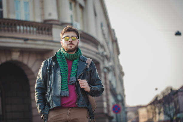 Portrait of a young hipster man standing outdoors