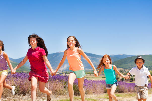 istock Excited children running together in Provence 857928276