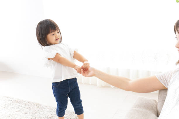 istock Parent and child playing in the room 857932288
