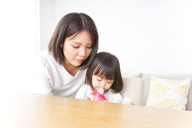 istock Parent and child playing in the room 857932324