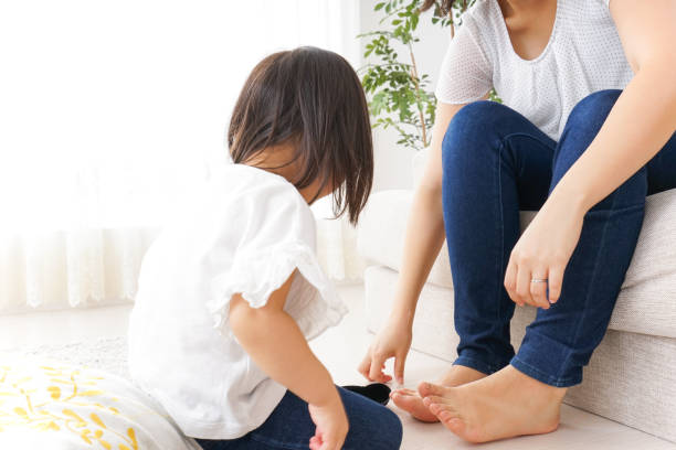 istock Parent and child playing in the room 857932346