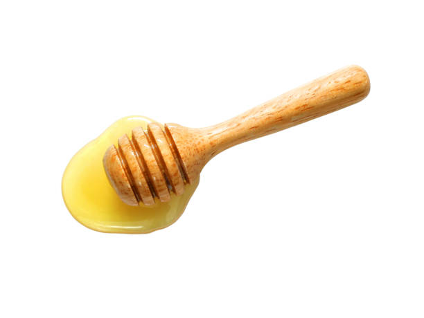 istock Honey with honey dipper 857933610