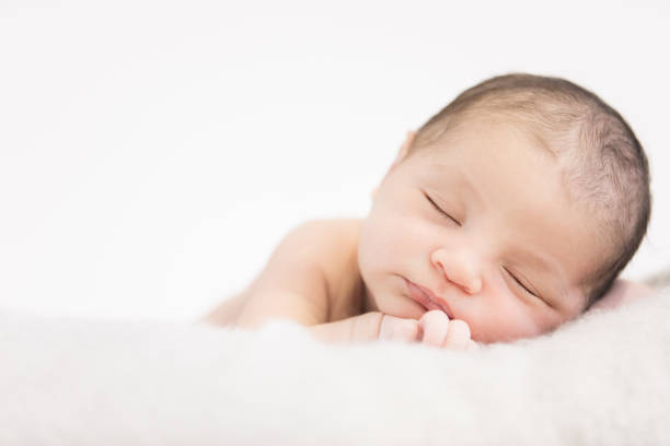 Newborn Cute newborn baby north african ethnicity stock pictures, royalty-free photos & images