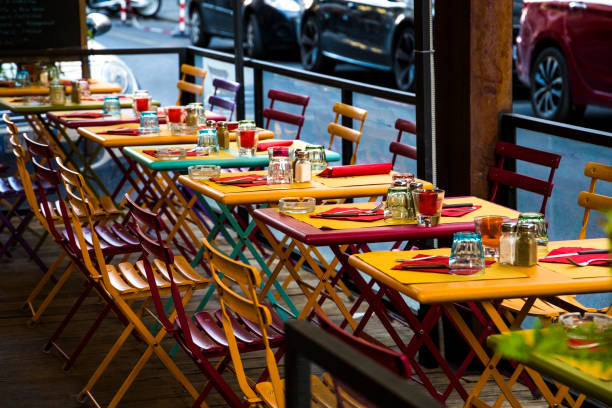 istock Colorful street cafe on the sidewalk 857943654