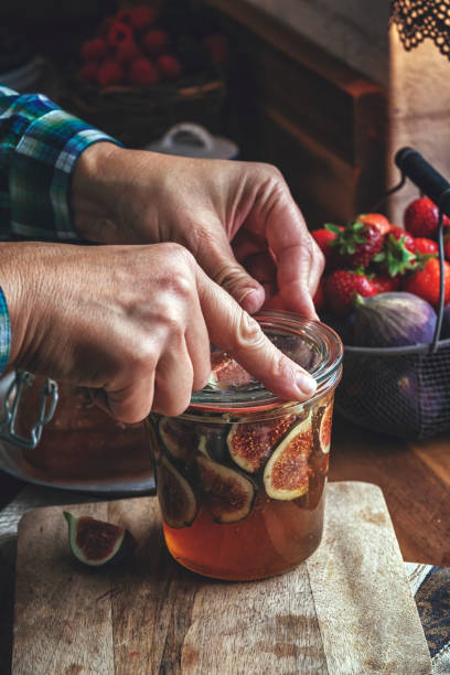istock Preserving Figs with Honey in Jars 857944118
