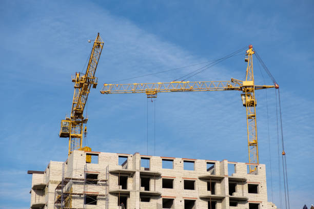 istock tower crane at a construction site on a Sunny day 857947868