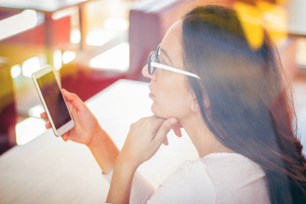 istock Reflections, coffee break and mobile phone 857958474