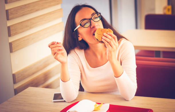 istock Enjoying my fast food 857958534