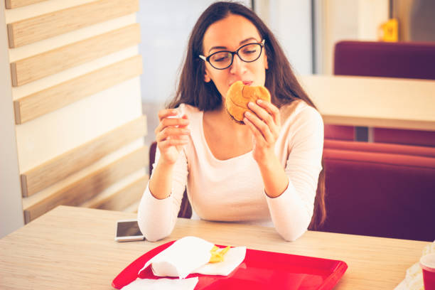 istock Enjoying my fast food 857958538