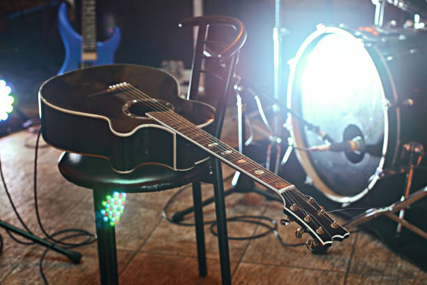 istock Guitar on a chair during a concert 857961442