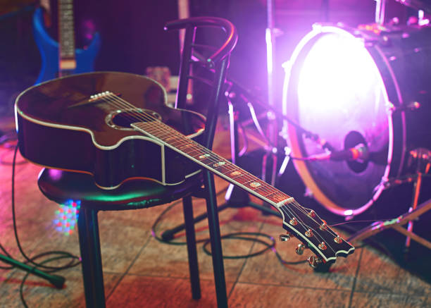 istock Guitar on a chair during a concert 857961492