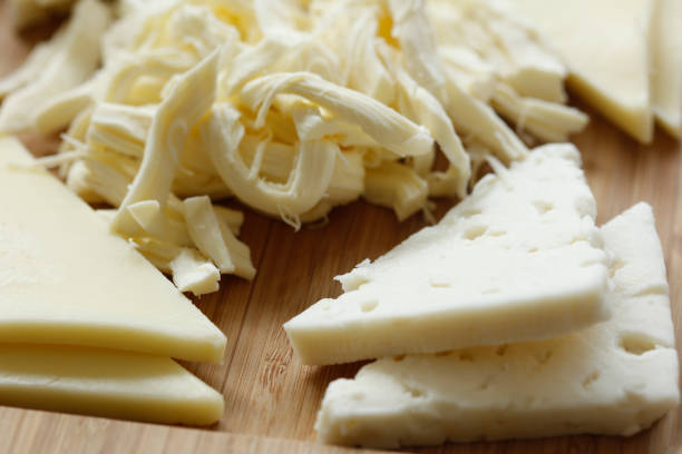 Cheese Cheese shredded mozzarella stock pictures, royalty-free photos & images