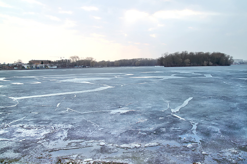 floating of ice on river at early spring evening