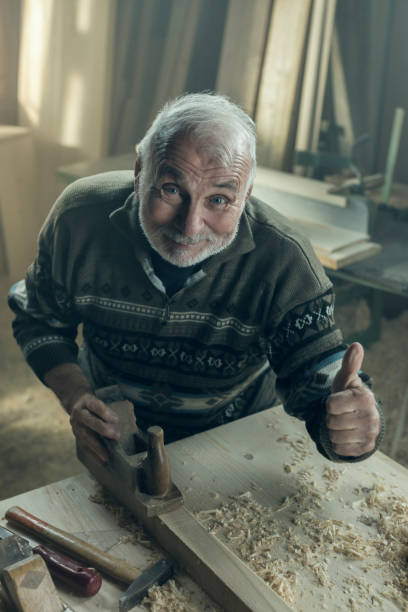 istock Senior Carpenter Showing Thumbs Up 857976406
