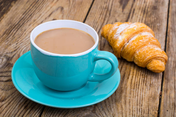 istock Coffee with milk, fresh pastry for breakfast 857976696