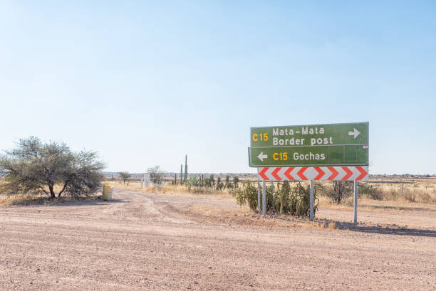 istock Signboard at  junction between C15 and C17-roads in Namibia 857982234
