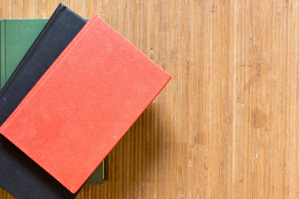 istock Several books on a mat of a brown color 857982238