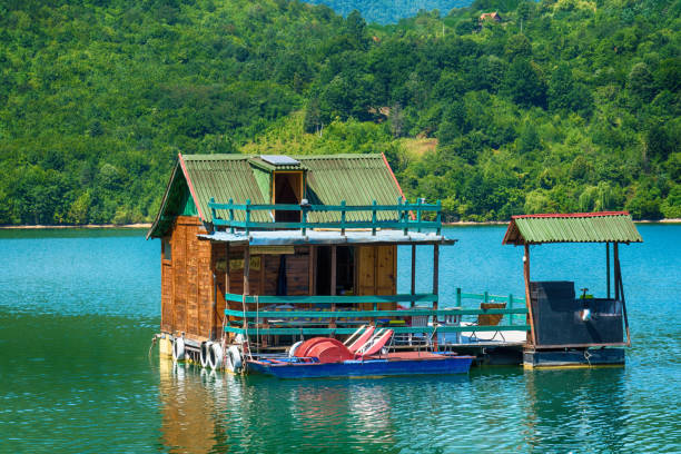 Houseboats of Perucac lake Perucac, Serbia July 31, 2017: Houseboats of Perucac lake, Tara National Park (Serbia) small houseboats stock pictures, royalty-free photos & images