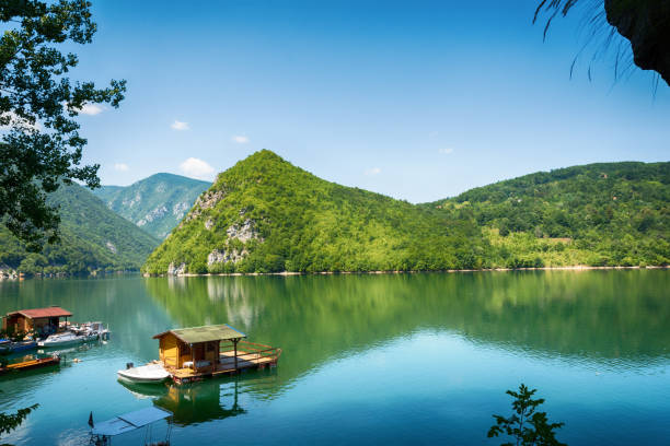 Houseboats of Perucac lake Perucac, Serbia July 31, 2017: Houseboats of Perucac lake, Tara National Park (Serbia) small houseboats stock pictures, royalty-free photos & images