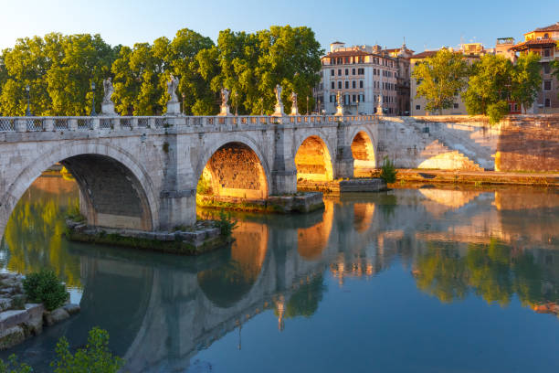 istock Saint Angel bridge at sunrise, Rome, Italy 857992404