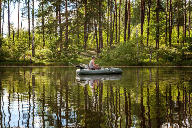 istock A fisherman in a boat 857993394