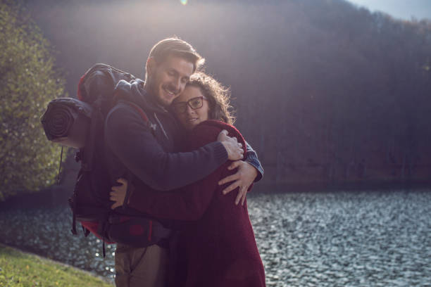 istock Couple in love Hugging by the Lake 857994026