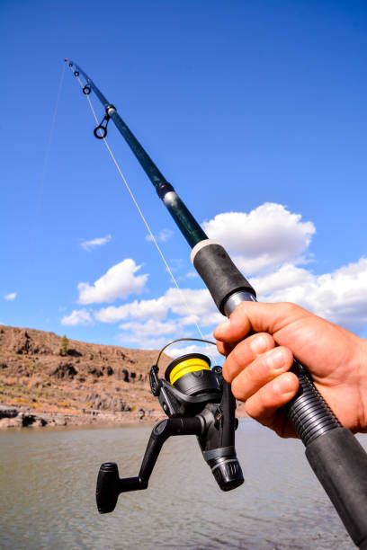 istock Fishing with rod on lake 857996010