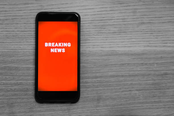 istock Cellphone Breaking News Alert 857996734