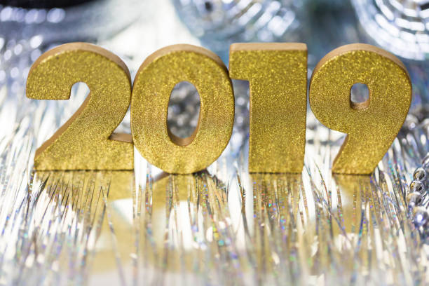 istock Gold numbers of 2019 year on a silver background. 858002978