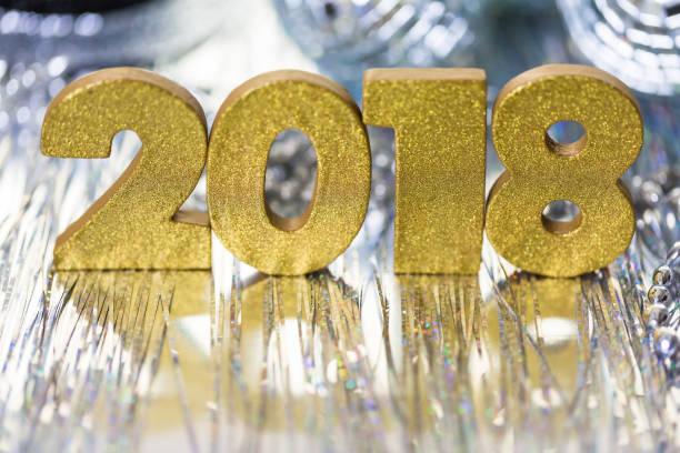 istock Gold numbers of 2018 year on a silver background. 858003024
