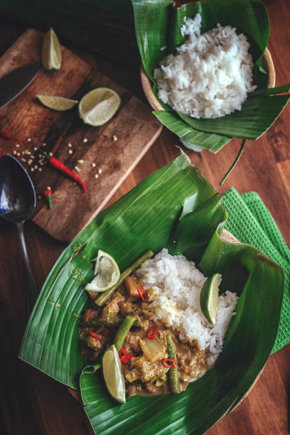 istock Balinese Pork Curry Dish with Jasmine Rice Served on Banana Leave 858008250