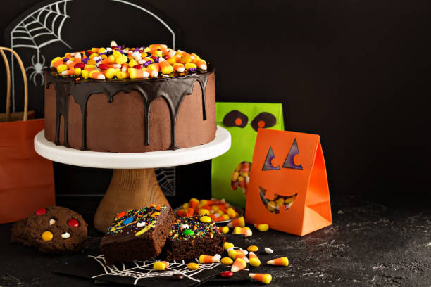 istock Halloween chocolate cake with candy on top 858012228