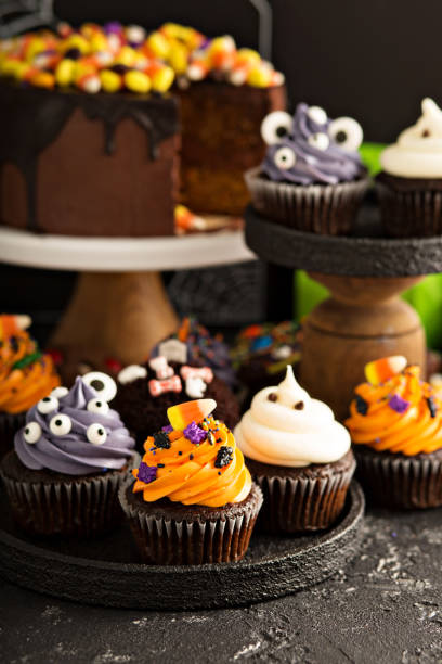 istock Festive Halloween cupcakes and treats 858014902