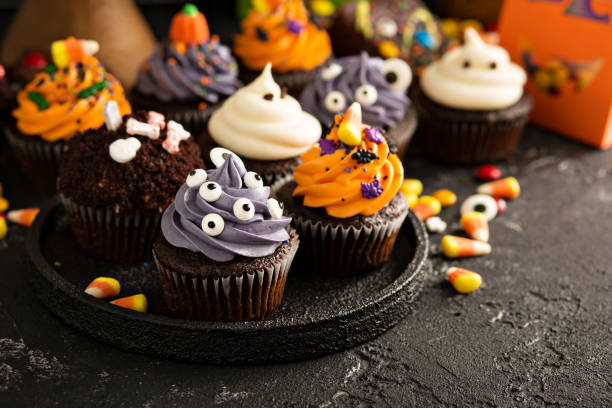istock Festive Halloween cupcakes and treats 858015042
