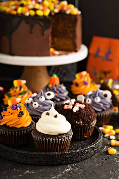 istock Festive Halloween cupcakes and treats 858015200