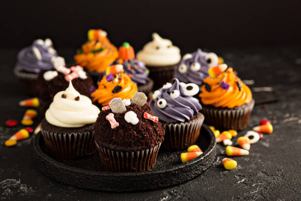 istock Festive Halloween cupcakes and treats 858015316