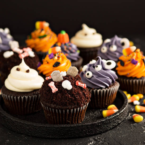 istock Festive Halloween cupcakes and treats 858015382