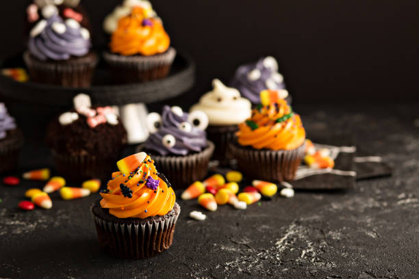 istock Festive Halloween cupcakes and treats 858015480