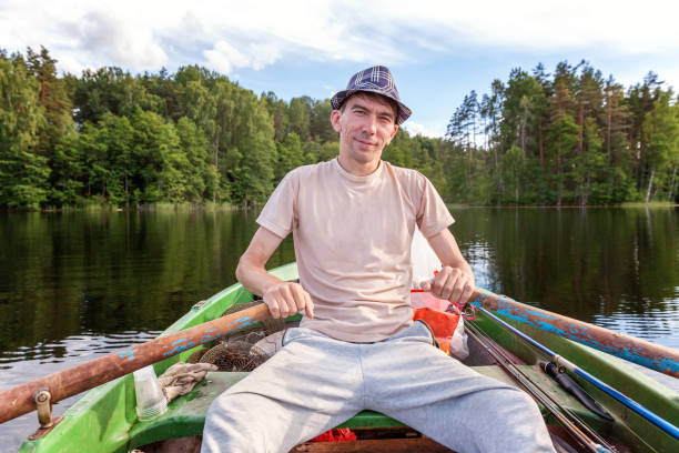 istock A fisherman in a boat 858015522
