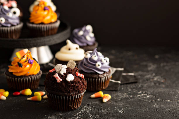 istock Festive Halloween cupcakes and treats 858015594