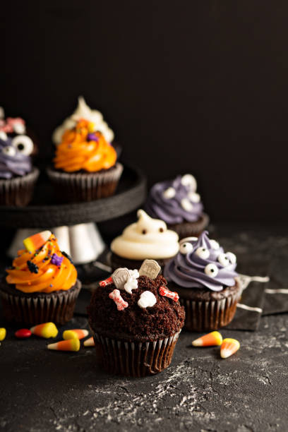 istock Festive Halloween cupcakes and treats 858015658