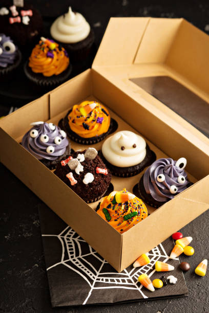 istock Festive Halloween cupcakes and treats 858015718