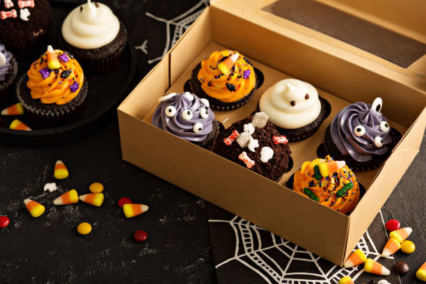 istock Festive Halloween cupcakes and treats 858016528