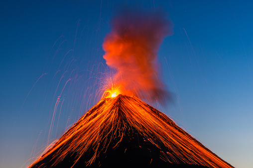 The Fuego volcano outside Antigua, Guatemala erupts in the early evening on Feruary 27, 2016.