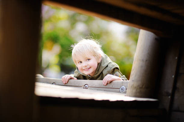 istock Happy little boy having fun on outdoor playground 858024200