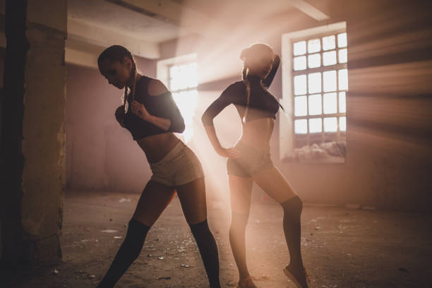 istock Two beautiful woman in abandoned room 858024386