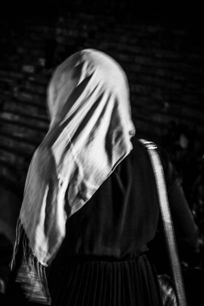 istock Muslim woman is walking 858024468