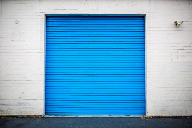 istock Blue Industrial Roll Up Door 858027336